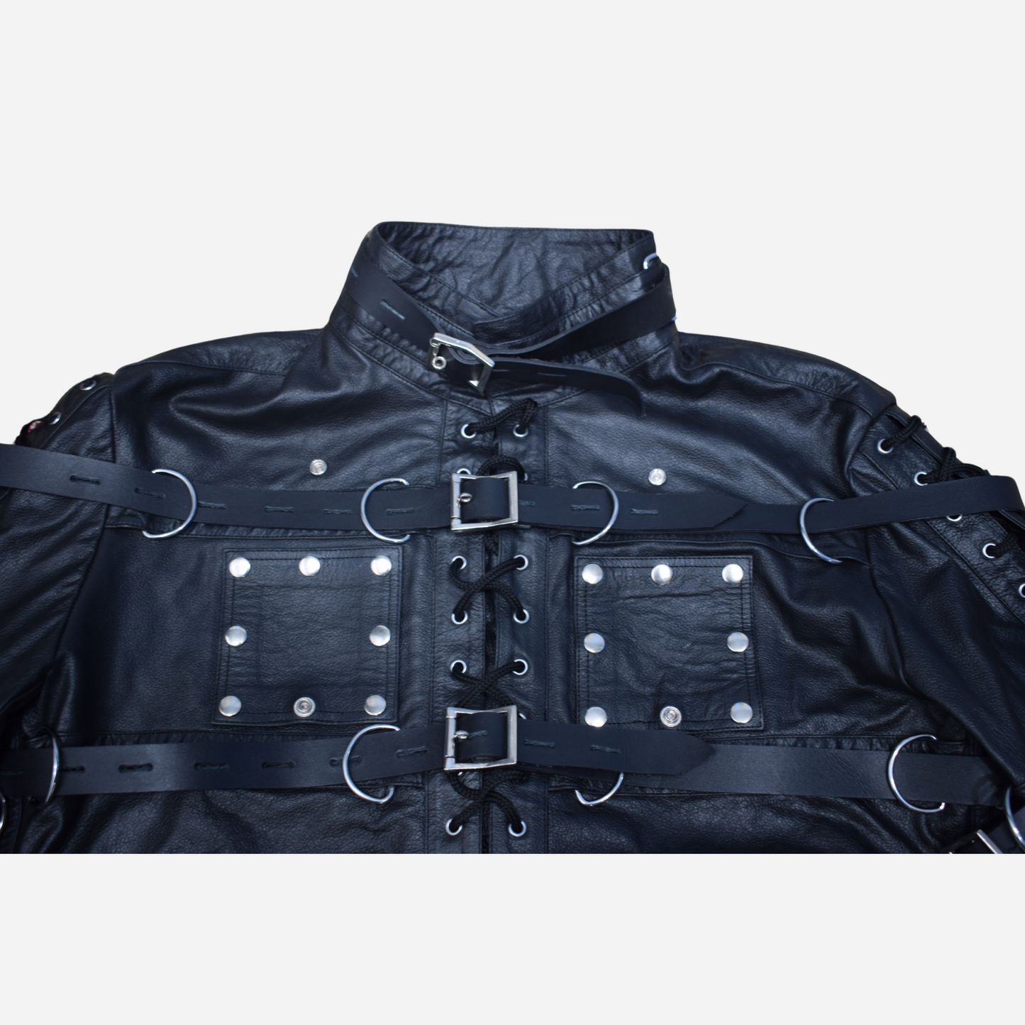 Black Genuine Leather durable set features an adjustable belt, detachable chest flaps, and a laced closure.