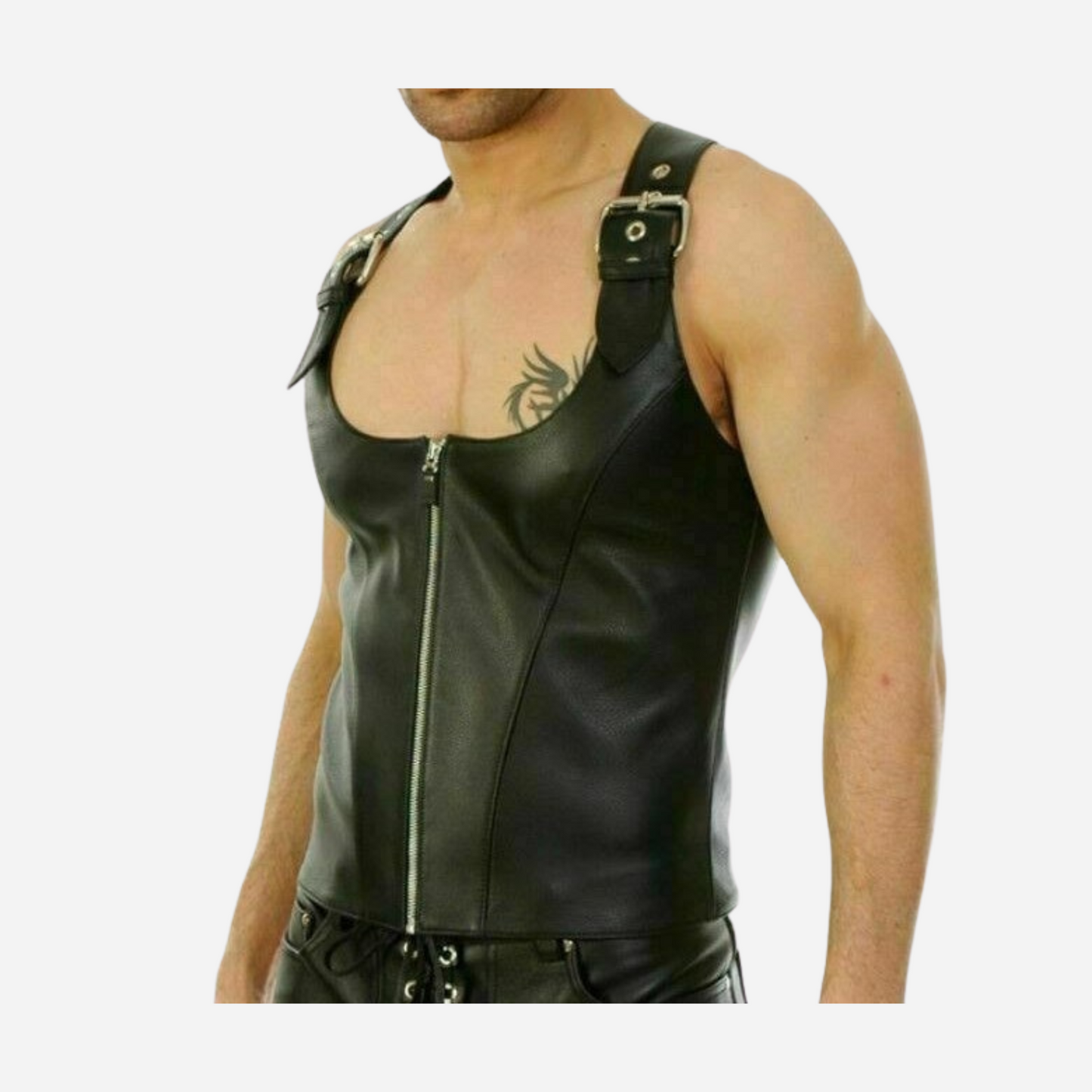 Our Stylish Black Genuine Leather Buckled Vest. Crafted from premium leather, it features adjustable buckles for a perfect fit, stylish lace-up details, and a modern zip corset top. Versatile and chic, this vest is ideal for any occasion. Discover our Leather Vests Collection and upgrade your wardrobe today!
