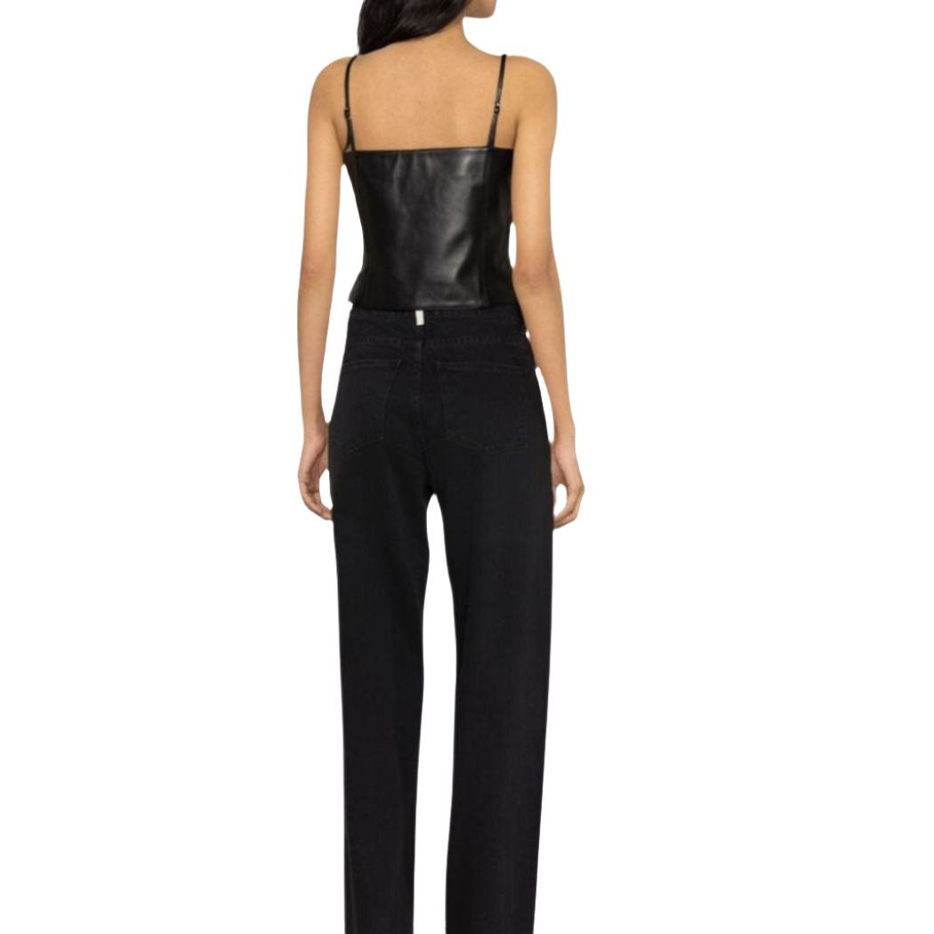 our Chic Genuine Asymmetrical Leather Top featuring spaghetti straps and a unique design. this leather top has a center front YKK zipper closure and contrasting necklines, this top adds a touch of edgy sophistication to any look.