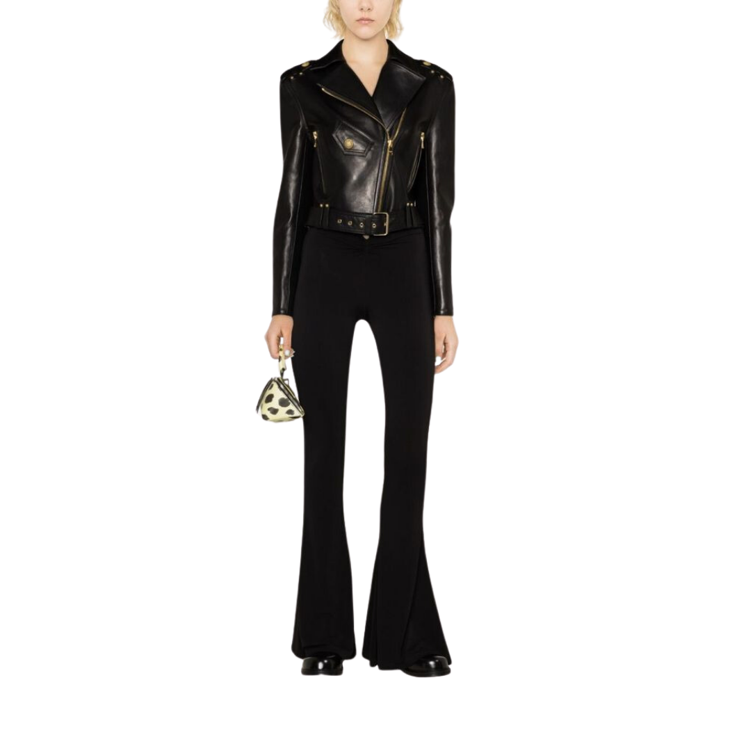 Elevate your style with our Luxurious Cropped Genuine Leather Jacket featuring a lapel zipper collar, 2 zipper pockets, and a waist belt on the hem for adjustability. Complete with gold accents made from genuine material for a touch of luxury. Shop now!