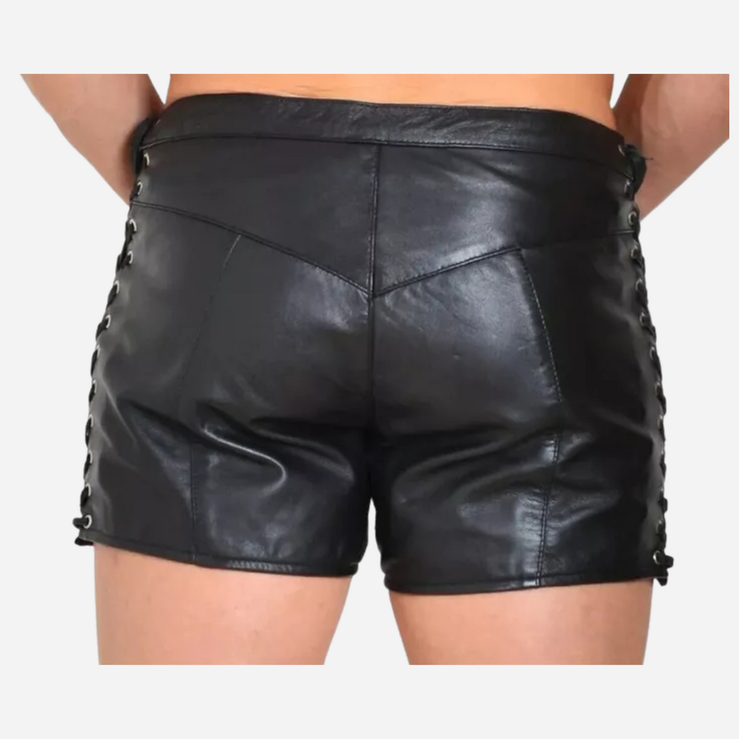 Shop our Men's Real Leather Lace-Up Shorts, made from 100% genuine leather for a stylish and comfortable fit. With adjustable sides, a fly zipper opening, and durable stitching, these slim-fit boxer shorts are perfect for any occasion. Available in all sizes, including custom options. Upgrade your wardrobe today!