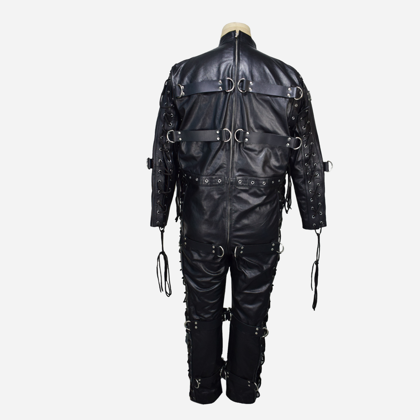 Black Genuine Leather catsuit with lace up front, opened chest flaps and zipper fastening back.