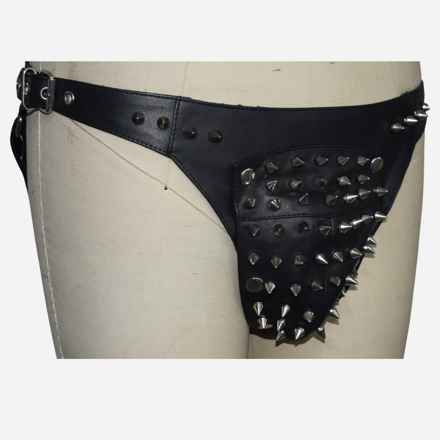 Real Leather Jockstrap with a detachable stud pouch for unmatched style and comfort. Featuring adjustable side buckles for a perfect fit, this timeless black jockstrap is expertly handmade with high-quality leather. Available in all sizes, including custom options. Elevate your intimate apparel today!
