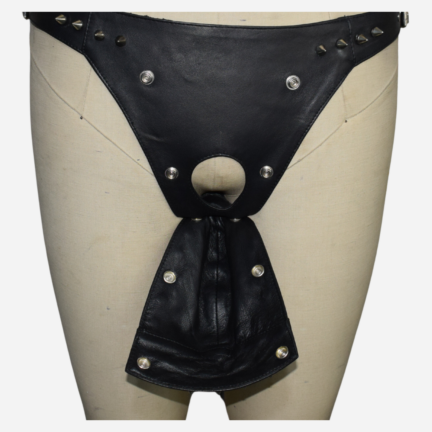 Real Leather Jockstrap with a detachable stud pouch for unmatched style and comfort. Featuring adjustable side buckles for a perfect fit, this timeless black jockstrap is expertly handmade with high-quality leather. Available in all sizes, including custom options. Elevate your intimate apparel today!