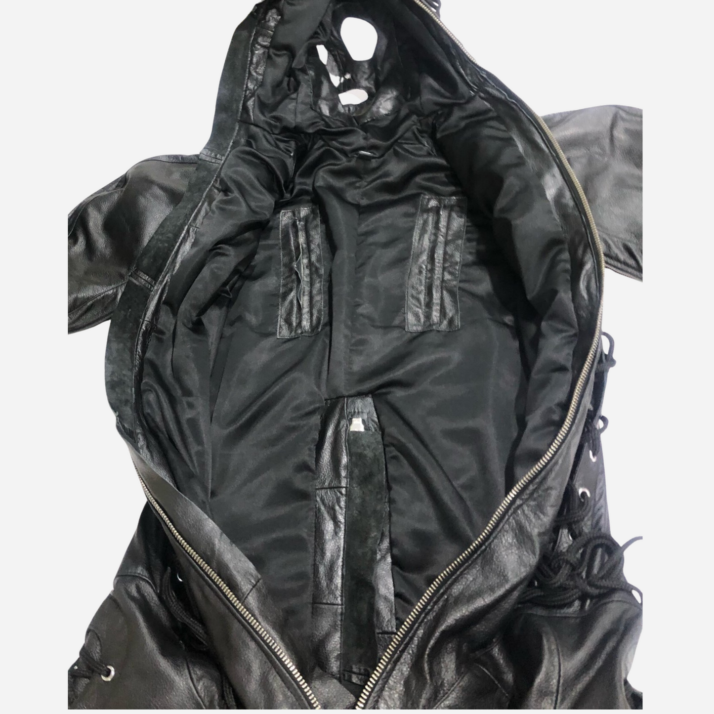 Explore our Real Leather Sleepsack with Hood Mask and Lacing. Designed for intense sensory play, it includes adjustable arm and leg binders, a two-way zipper, and steel boned support. Ideal for those seeking durable, high-quality bondage gear. Order now for an unforgettable experience!