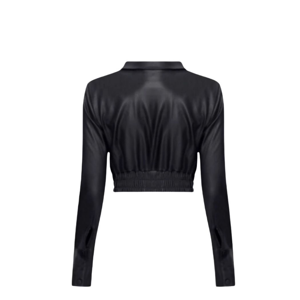 Add a chic touch to your outfit with our Genuine Leather Cropped Button-Down featuring an open eyelet opening and closure. Complete this leather button shirt with a chic collar, thick elastic band on the hem, and two front pockets for storage.