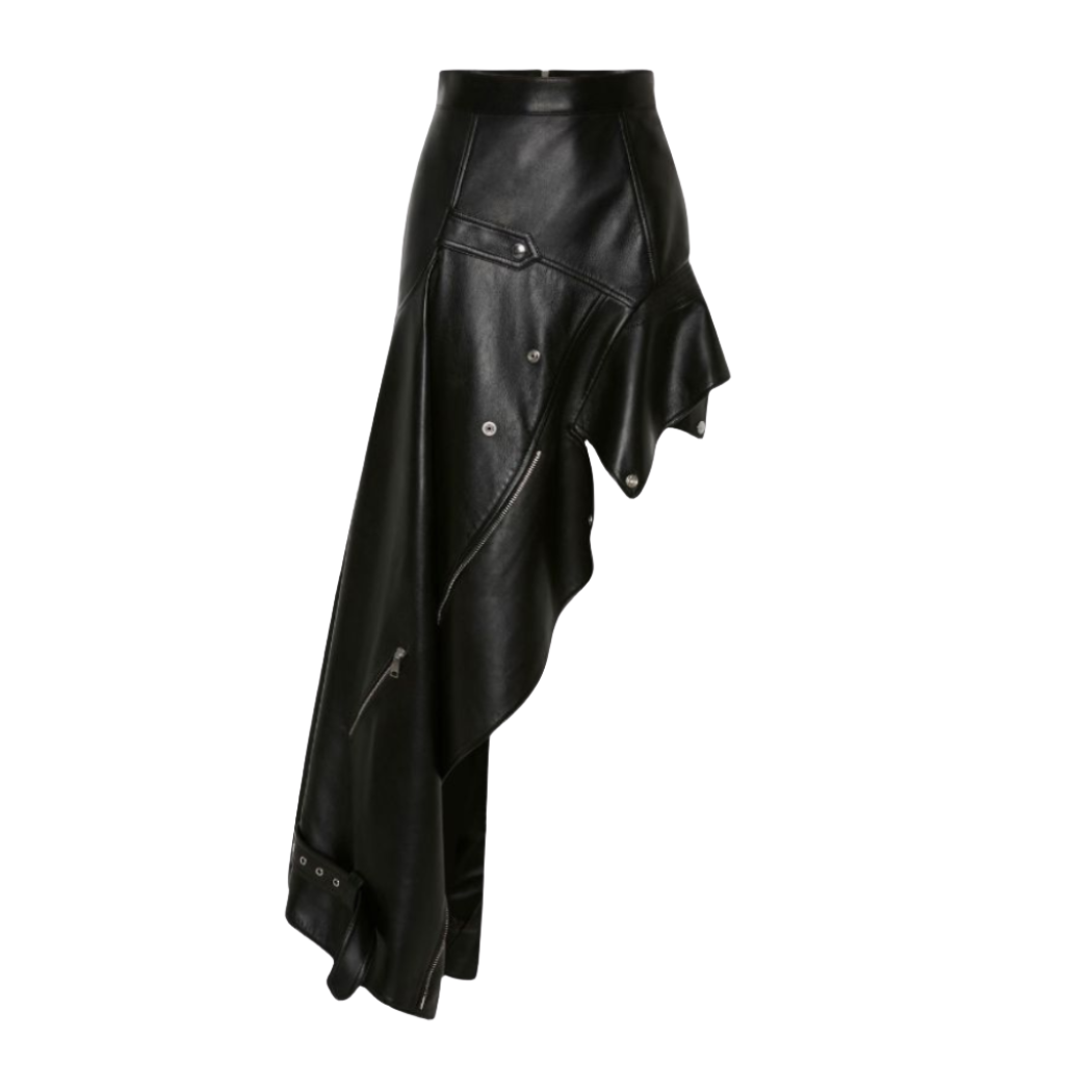 our Mabel Asymmetrical Leather Skirt, featuring a chic side tail design. Crafted from smooth leather for a sleek and comfortable look, this skirt is perfect for the fashion-forward individual looking to make a statement. this leather skirt is size inclusive from XS to 4XL