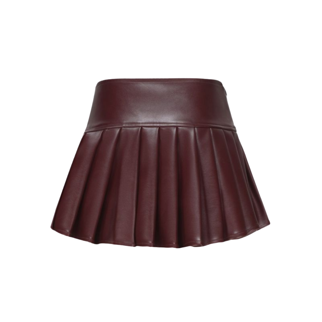 our chic Petra Pleated leather Skirt crafted in luxurious burgundy genuine leather. Handmade with premium stitching, it's a versatile staple for any fashion enthusiast seeking quality and style.