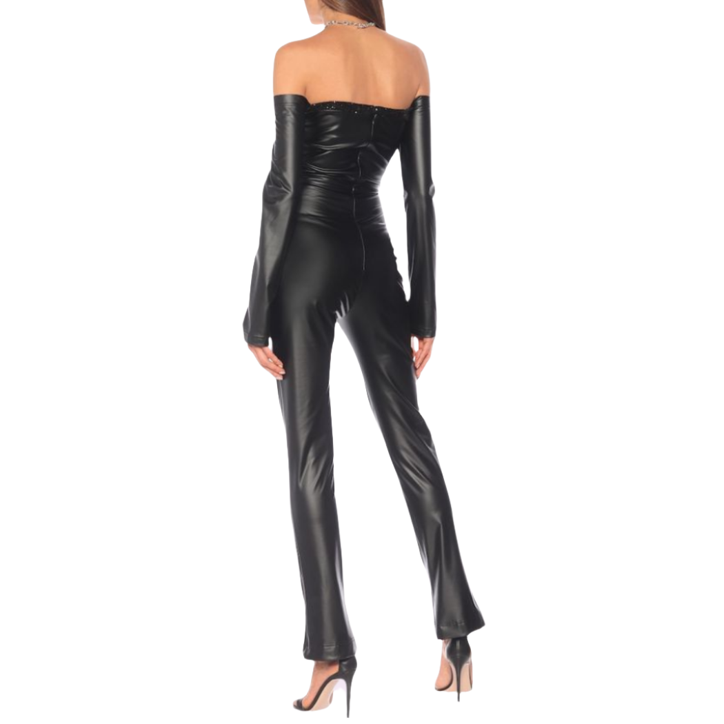 Step into sophistication with our Black Leather Off-Shoulder Jumpsuit. Crafted from genuine leather, this handmade piece features attached flare pants and a fitted top with premium stitching. Shop now for timeless elegance!