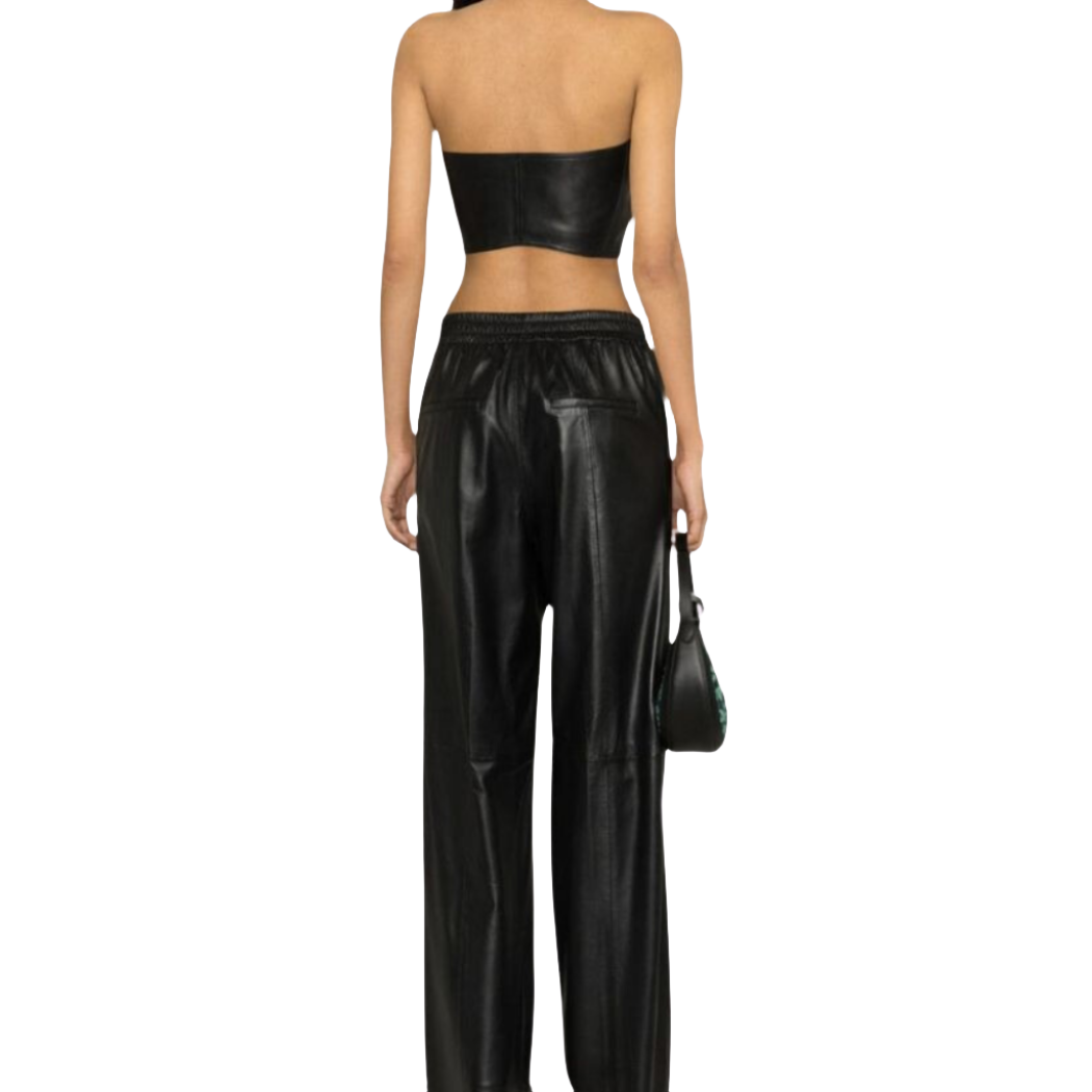 Make a statement with our Forward and Chic Genuine Leather Bustier Crop Top featuring three adjustable silver belt buckles on the center front. Elevate your style with this trendy and edgy piece. Shop now