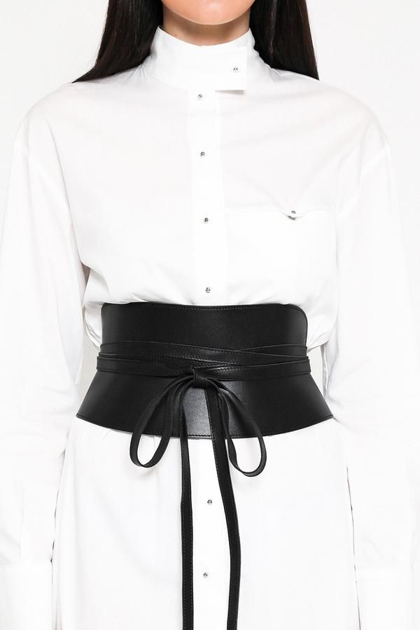 Thick genuine leather waist belt with a stylish bow tie design, perfect for accentuating curves and elevating any outfit.