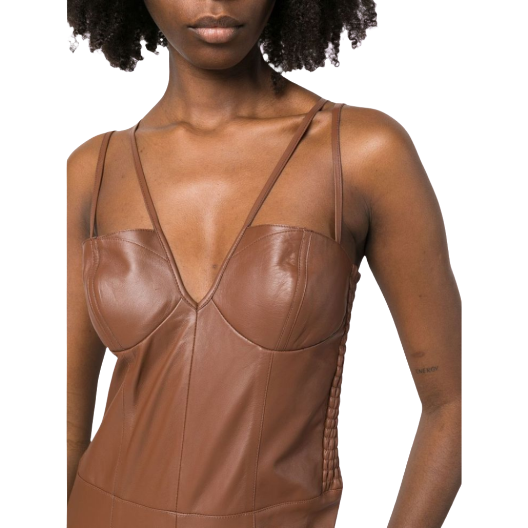 our Matilda Brown Leather Jumpsuit, featuring dual spaghetti straps, flare bottoms, and a slim-fit top with a deep V-neck. Crafted from smooth leather for a sleek and comfortable feel, this jumpsuit has a ruched back for better fitting and is handmade with premium stitching and cutting for superior quality